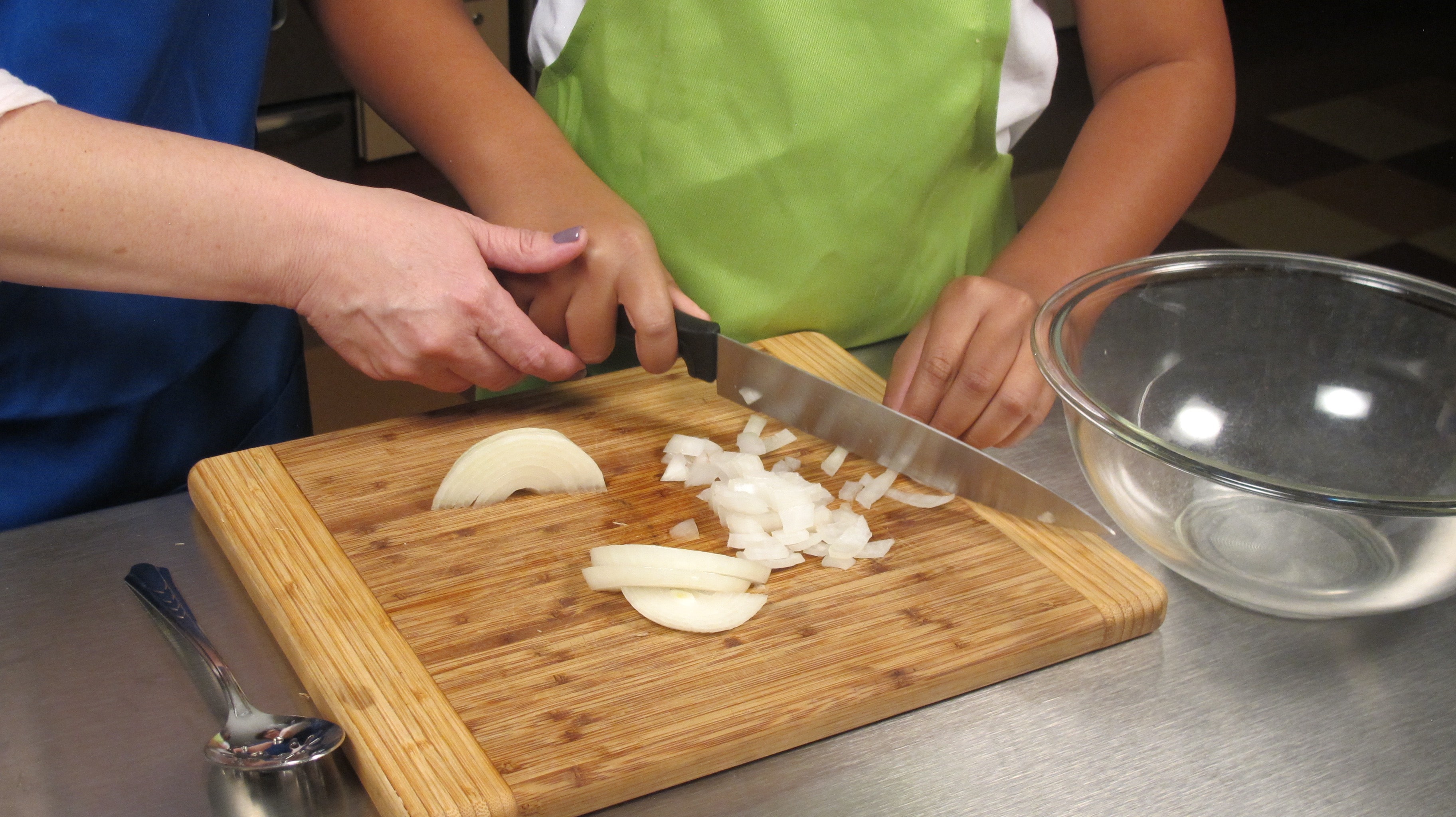 Peel skin off onion. Chop and add to bowl.
